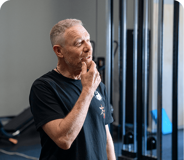 Older adult during a strength assessment